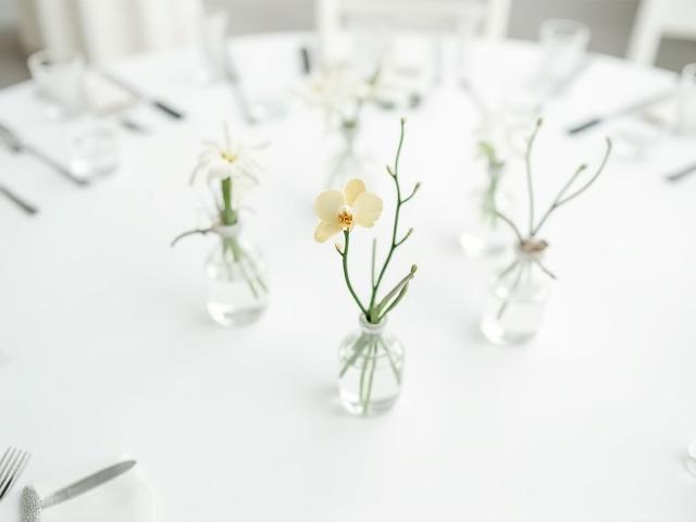 Clean lines reception table with minimalist floral decor
